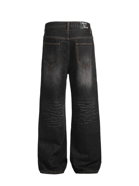Washed cat whisker scratched jeans