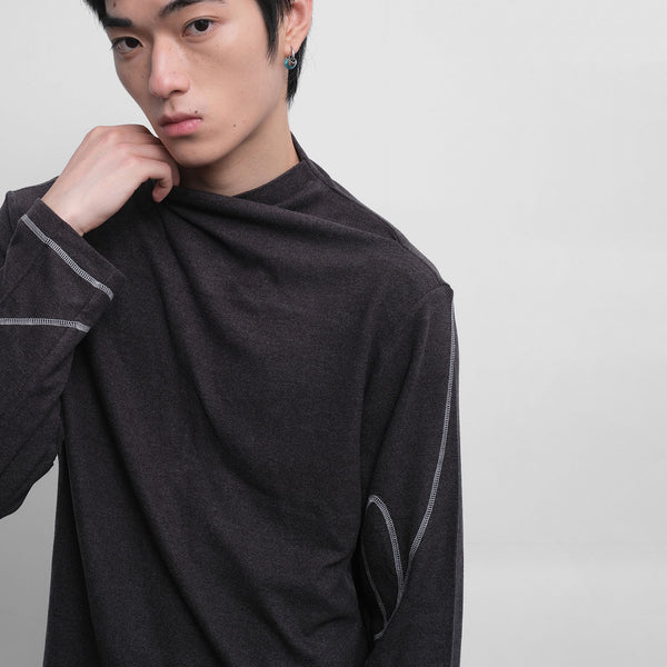 Slant collar topstitched long sleeves knit top with pleated neckline